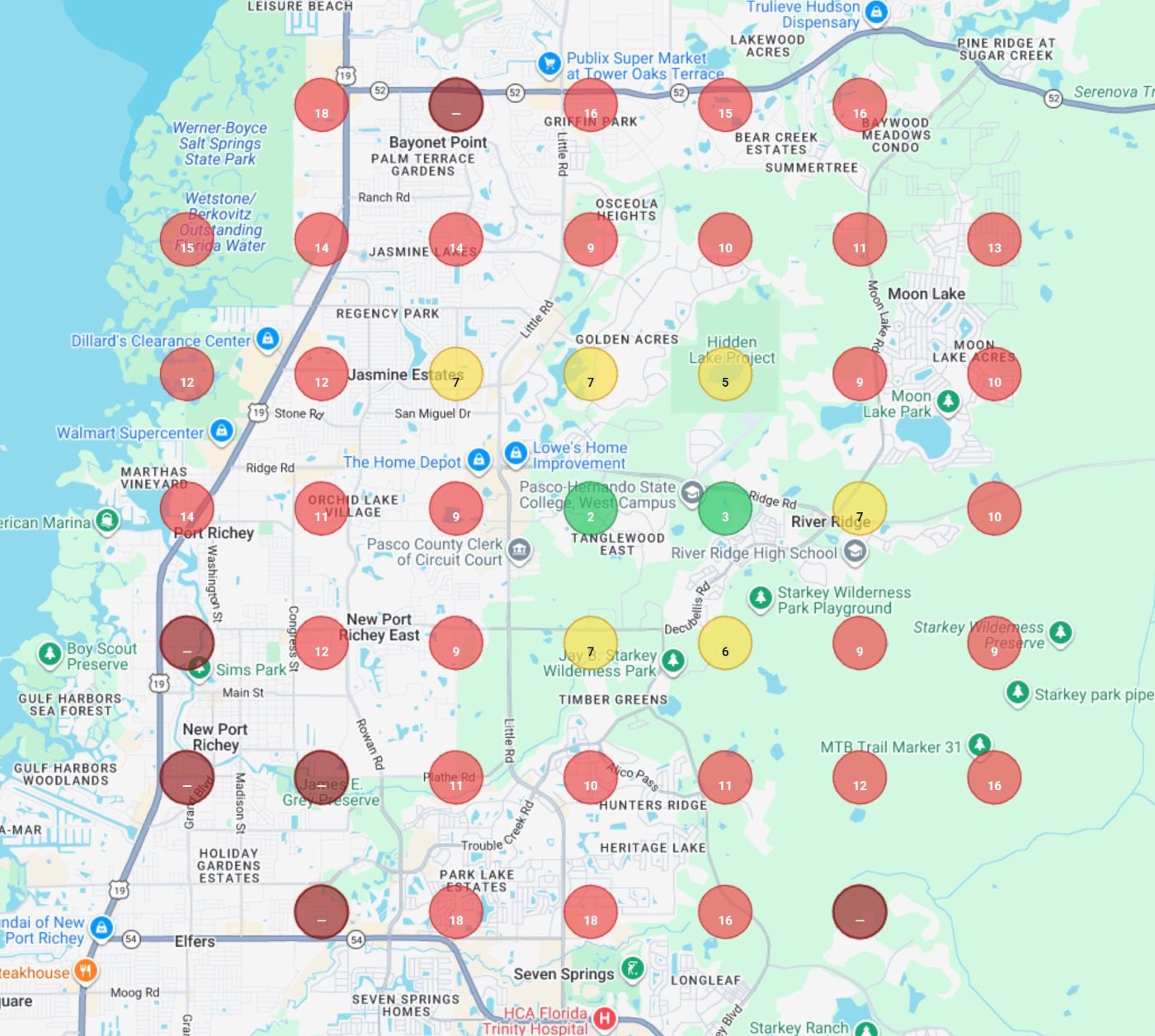 Geo-grid ranking report: dozens of search-location pins colour-coded by current rank across a service area